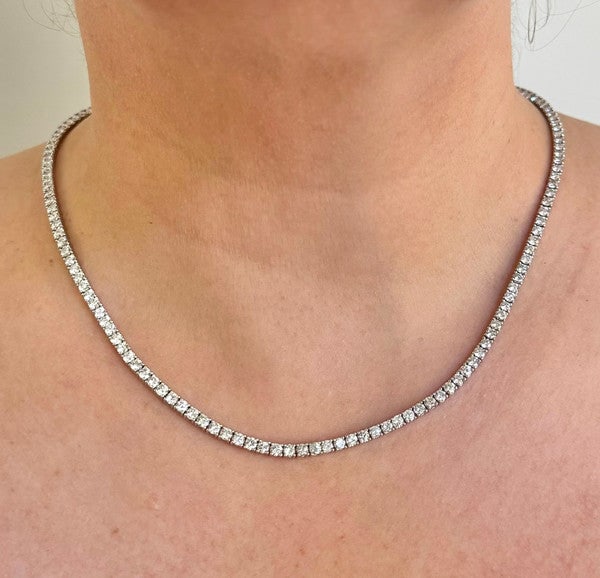 Brand New 14cttw Natural Diamond Tennis Necklace in 14k White Gold 18": Condition: Brand NewMetal: 14k Gold (Stamped)Weight: 18gDiamonds: Round Cut Natural Diamonds 14cttwDiamond Color and Clarity: H and SI3/I1Width: 3mmClosure: Box Tab Insert with Two Safety LatchesMarki