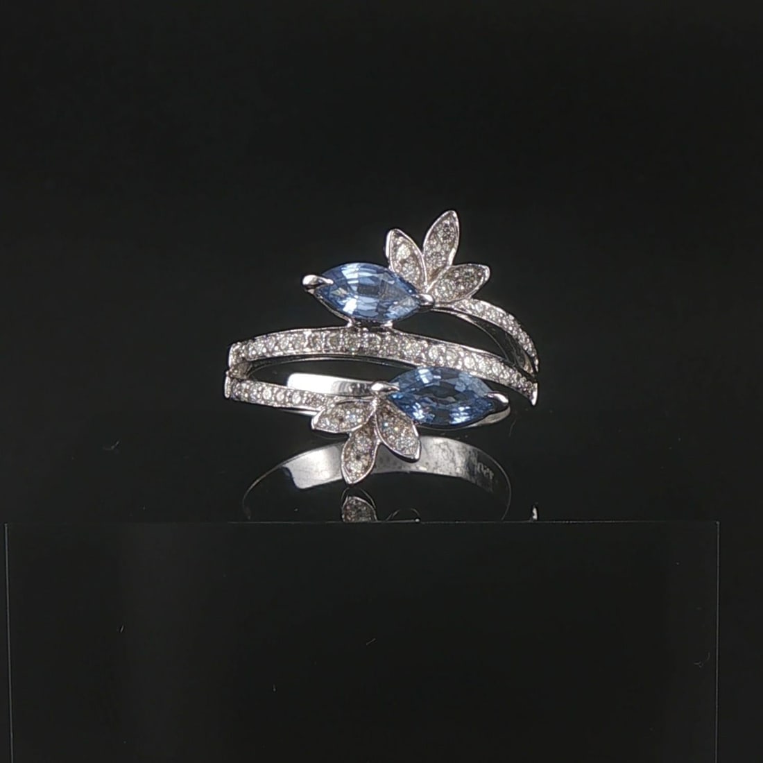 Salavetti 18k White Gold Topaz and Diamond Bypass Band Ring Size 7: Condition: Excellent Condition, Professionally Cleaned Metal: 18k Gold (Marked, and Professionally Tested) Weight: 5.7g Gemstone: Two Marquise Cut Topaz Diamonds: 0.30cttw Round Cut Natural Diamonds W