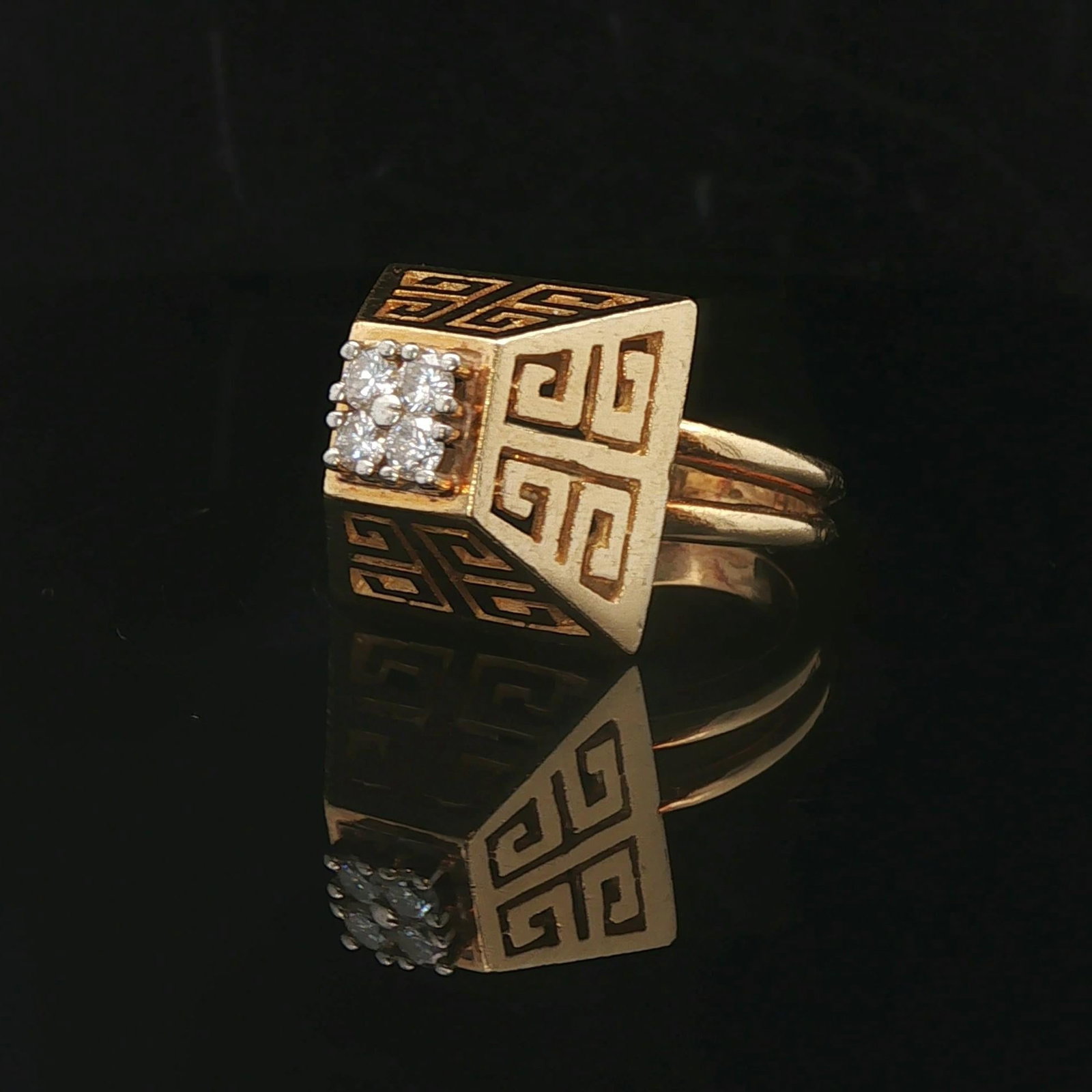 Tiffany & Co. 18k Yellow Gold and 0.40cttw Diamond Greek Key Ring Size 6: Condition: Excellent Condition, Professionally Cleaned Metal: 18k Gold (Marked, and Professionally Tested) Weight: 12.4g Diamonds: Four Round Cut Natural Diamonds 0.40cttw Face Measurements: 17mm by 1