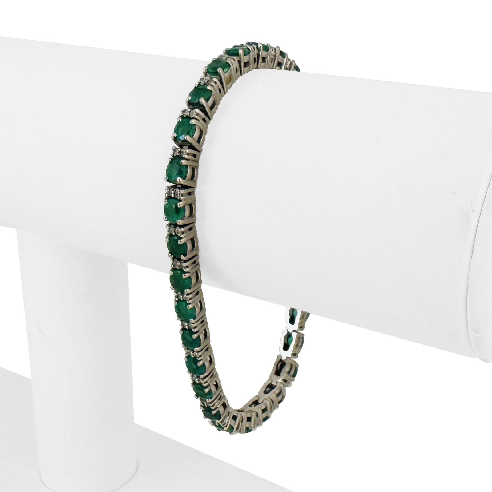14k White Gold 4cttw Emerald and 0.50cttw Diamond Tennis Bracelet 7": Condition: Excellent Condition, Professionally Cleaned Metal: 14k Gold (Marked, and Professionally Tested) Weight: 17.7g Gemstones: 4cttw Round Cut Emeralds Diamonds: 0.50cttw Round Cut Natural Diamon