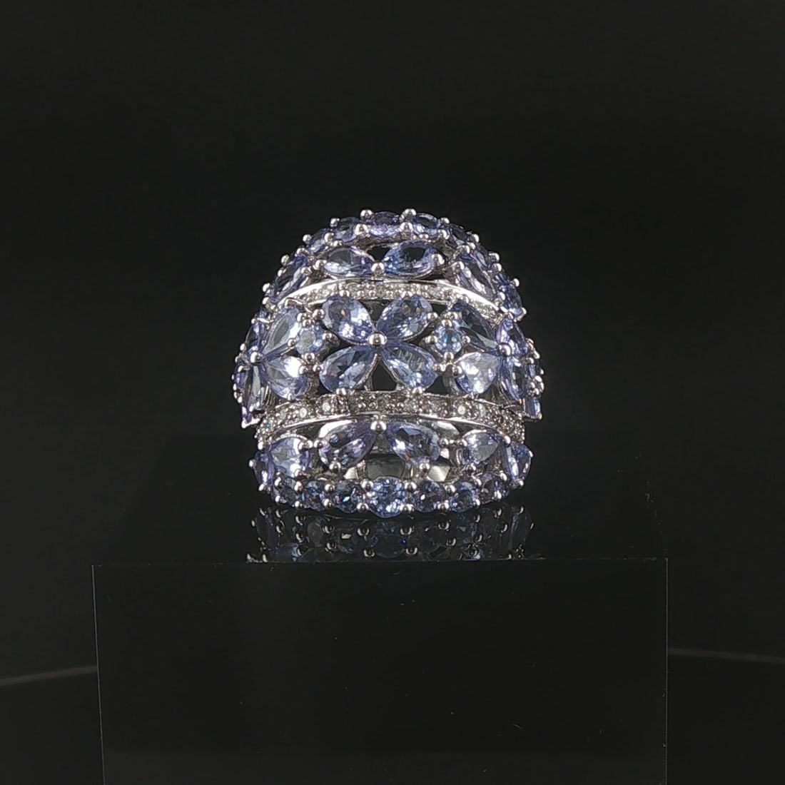 14k White Gold Tanzanite and Diamond Large Floral Ring Size 6: Condition: Excellent Condition, Professionally Cleaned Metal: 14k Gold (Marked, and Professionally Tested) Weight: 9.3g Gemstone: Round and Pear Cut Tanzanite Diamonds: 0.12cttw Round Cut Natural Diam