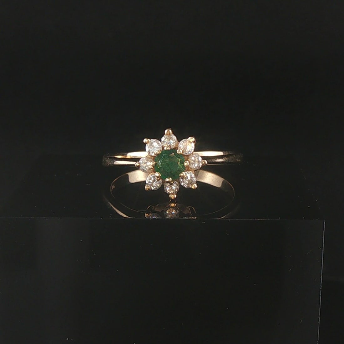 14k Yellow Gold Emerald and Diamond Halo Ladies Ring Size 7.5: Condition: Excellent Condition, Professionally Cleaned Metal: 14k Gold (Marked, and Professionally Tested) Weight: 2.6g Gemstone: 0.25ct Round Cut Emerald Diamonds: 0.20cttw Round Cut Natural Diamonds