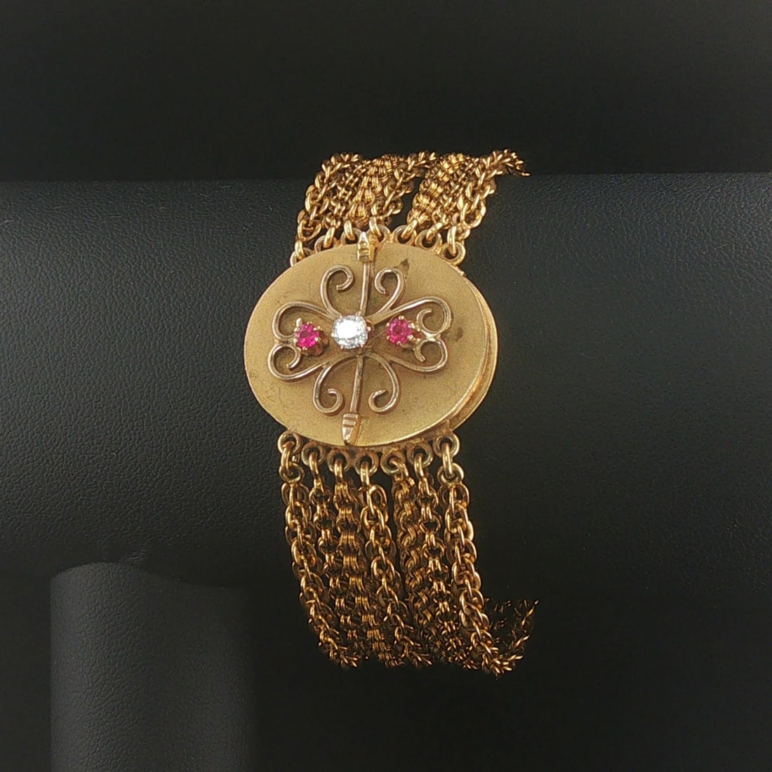 14k Yellow Gold Pink Sapphire & Diamond Heavy Seven Strand Bracelet 7.25": Condition: Excellent Condition, Professionally Cleaned Metal: 14k Gold (Marked, and Professionally Tested) Weight: 42.7g Gemstones: Two Round Cut Pink Sapphires Diamonds: 0.25ct Round Cut Natural Diam