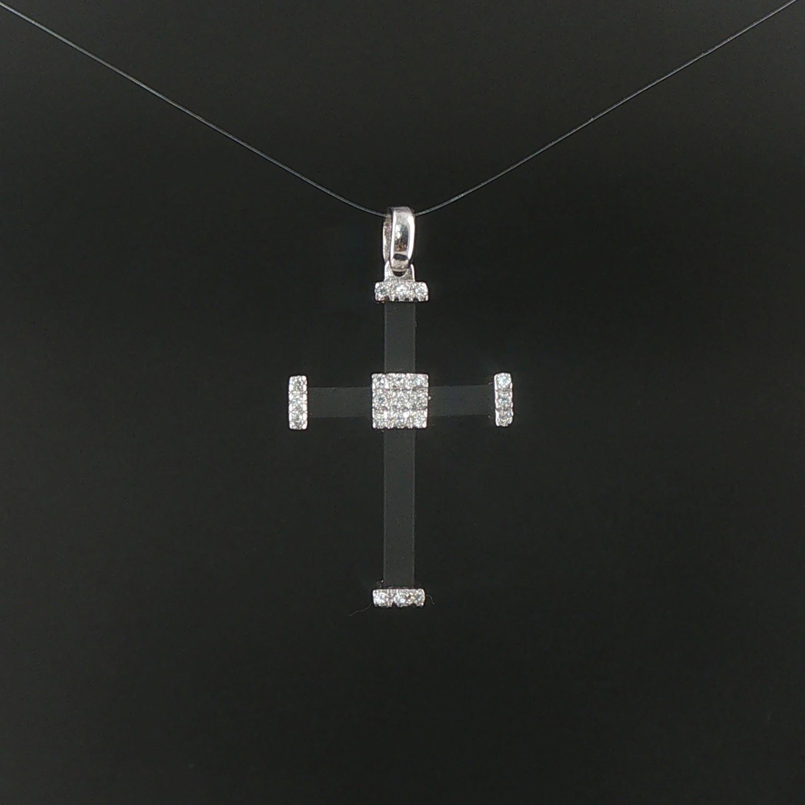18k White Gold 0.25cttw Diamond and Rubber Cross Pendant 1.5": Condition: Excellent Condition, Professionally Cleaned and Polished Metal: 18k Gold (Marked, and Professionally Tested) Weight: 4.2g Diamonds: 0.25cttw Round Cut Natural Diamonds Length: 1.5 Inches Wi