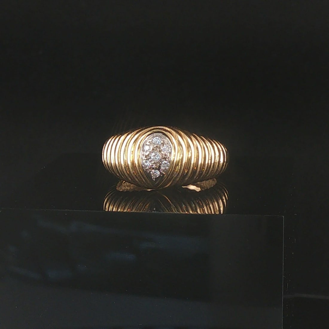18k Yellow Gold and Diamond Vintage Ribbed Ring Size 4.25: Condition: Excellent Condition, Professionally Cleaned Metal: 14k Gold (Professionally Tested) Weight: 5.7g Diamonds: 0.07cttw Round Cut Natural Diamonds Band Width: 9.5mm at face, 3.5mm at back Size: