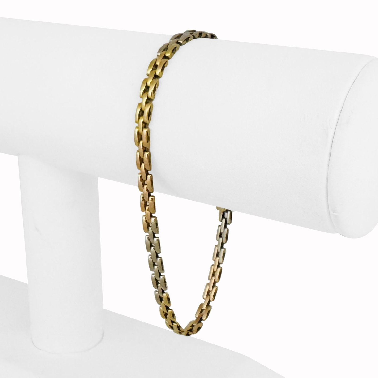18k Yellow White and Rose Gold Thin Panther Link Bracelet 7": Condition: Excellent Condition, Professionally Cleaned Metal: 18k Gold (Marked, and Professionally Tested) Weight: 9.2g Length: 7 Inches Width: 3.5mm Closure: Box Tab Insert with Safety Latch Markings