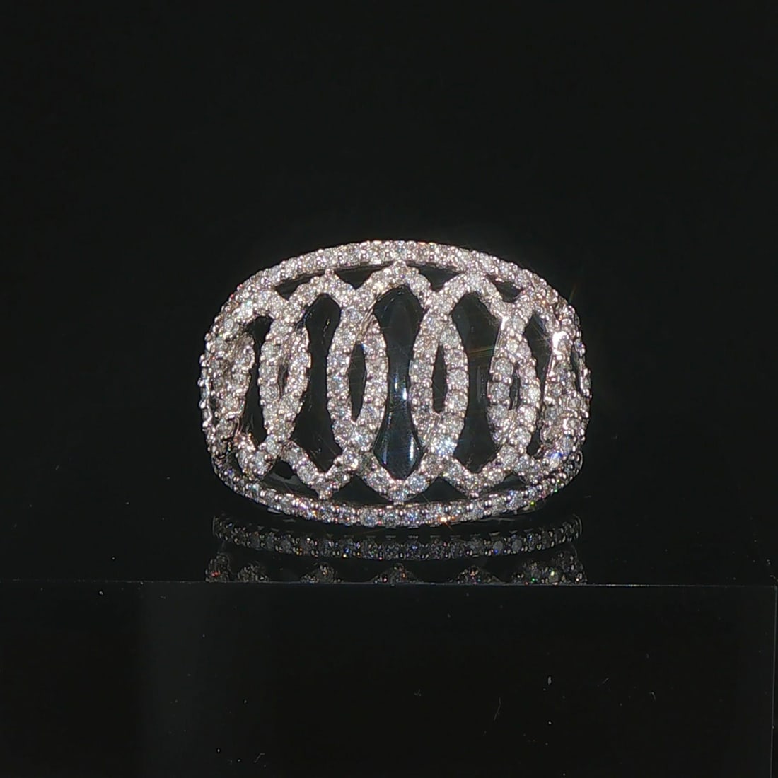 14k White Gold Onyx and 1cttw Diamond Interlockin: Condition: Excellent Condition, Professionally Cleaned Metal: 14k Gold (Marked, and Professionally Tested) Weight: 9.8g Gemstone: Black Onyx Diamonds: 1cttw Round Cut Natural Diamonds Band Width: