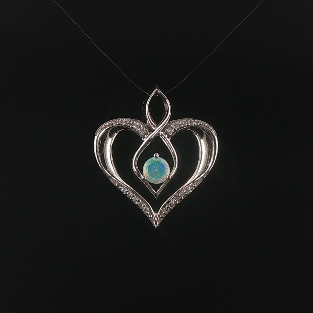 14k White Gold Opal and Diamond Vintage Heart Pen: Condition: Excellent Condition, Professionally Cleaned Metal: 14k Gold (Marked, and Professionally Tested) Weight: 6g Gemstone: Round Cut Opal Diamonds: 0.15cttw Round Cut Natural Diamonds Length: 1 I