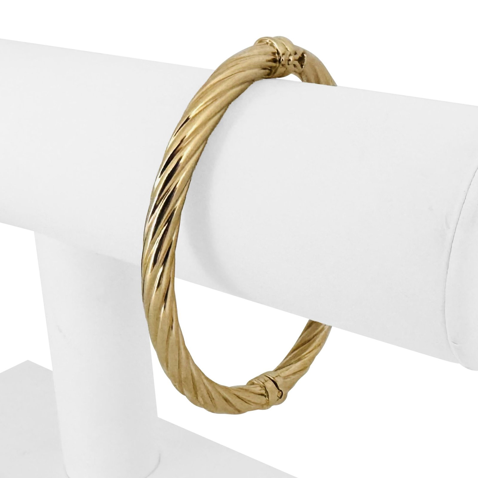 14k Yellow Gold Hollow Light Twisted Spiral Bangl: Condition: Excellent Condition, Professionally Cleaned Metal: 14k Gold (Marked, and Professionally Tested) Weight: 7.1g Length: 7 Inches Inner Circumference Width: 5.5mm Closure: Box Tab Insert with S