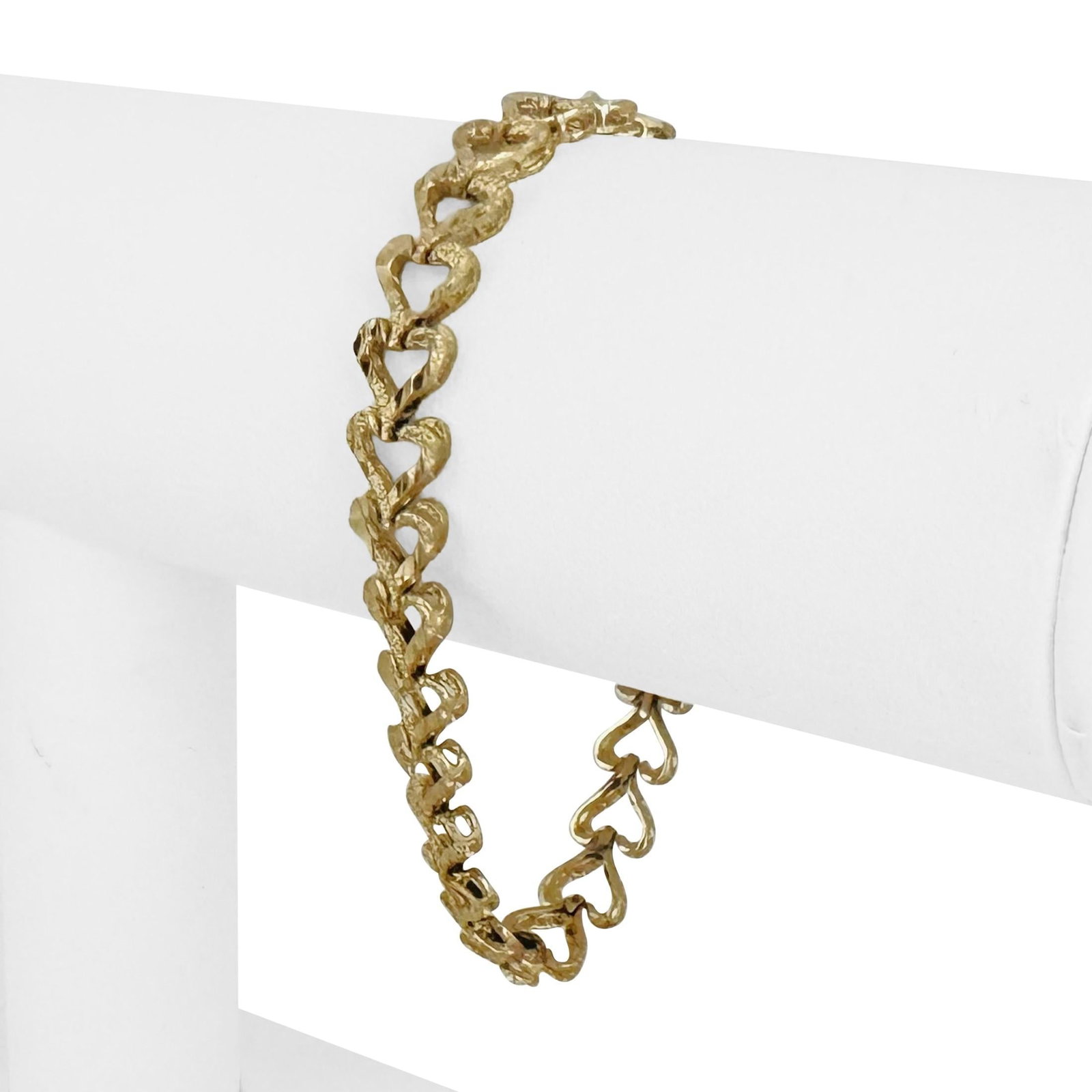 14k Yellow Gold Solid Diamond Cut Heart Link Brac: Condition: Excellent Condition, Professionally Cleaned Metal: 14k Gold (Marked, and Professionally Tested) Weight: 9.8g Length: 7 Inches Width: 8mm Closure: Box Tab Insert with Safety Latch Markings: 