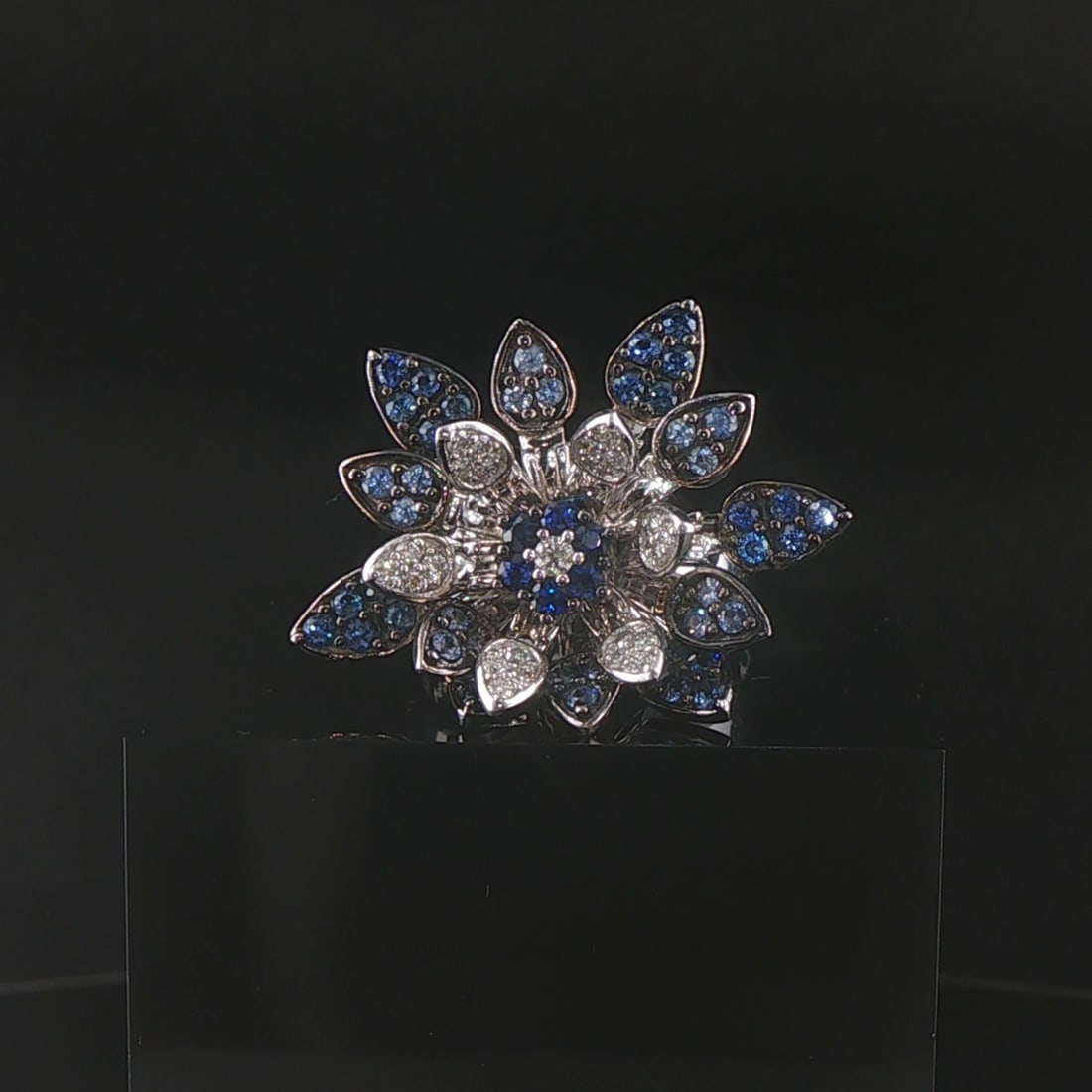 Effy 14k White Gold Blue Sapphire and Diamond Flo: Condition: Excellent Condition, Professionally Cleaned Metal: 14k Gold (Marked, and Professionally Tested) Weight: 13.1g Gemstone: Round Dark and Light Blue Sapphires Diamonds: 0.12cttw Round Cut Natu