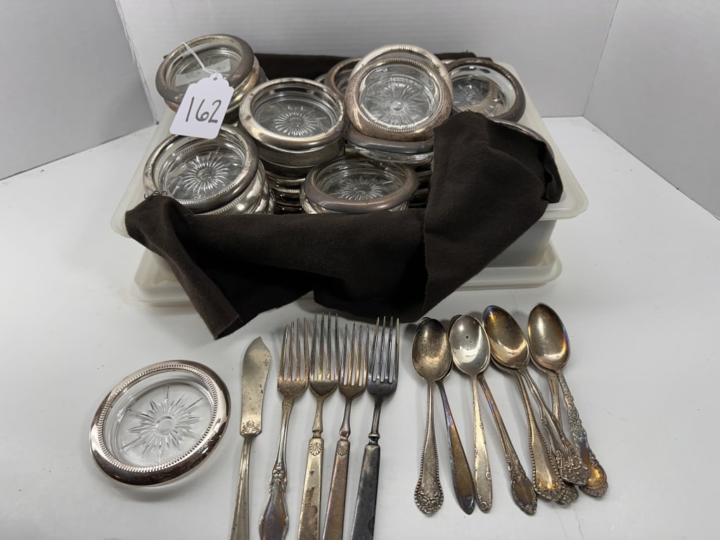 SILVER PLATED COASTERS AND MISC SILVERWARE: .