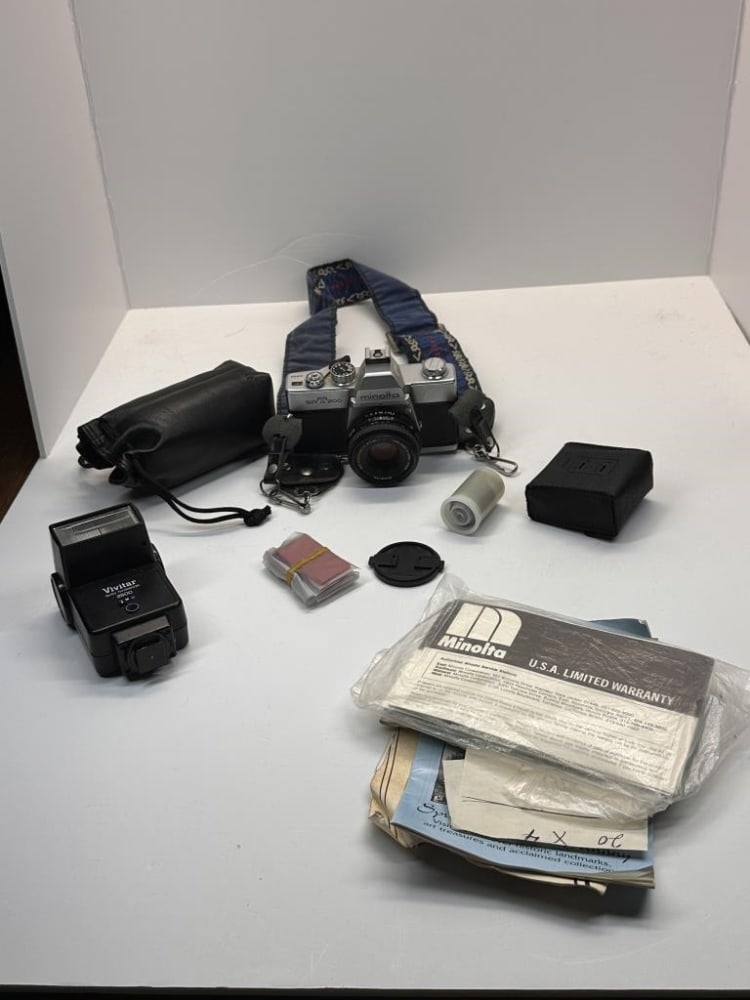 CAMERA BAG WITH CONTENTS: MANUAL BOOK, CAMERA, FILM
