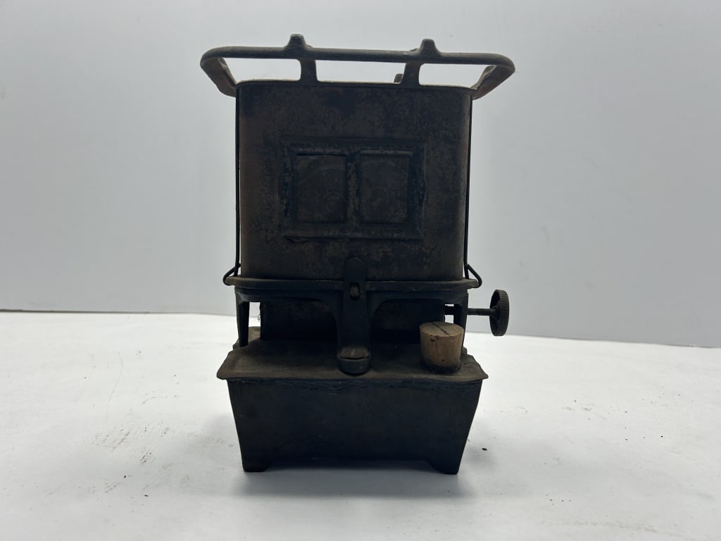 ANTIQUE SAD IRON HEATER (1 of 3)