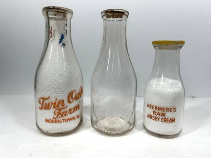 (3) MILK BOTTLES WITH ADVERTISING: TWIN OAK FARMS, HECKMERES RAW JERSEY CREAM