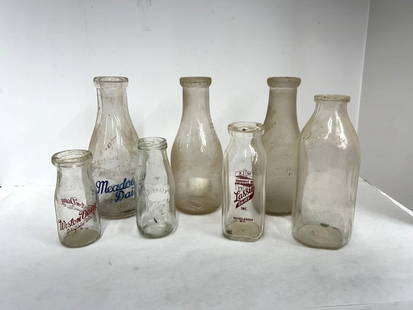 (7) MILK BOTTLES WITH ADVERTISING: MEADOW DAIRY, WESTON DAIRY, LASSIG DAIRY