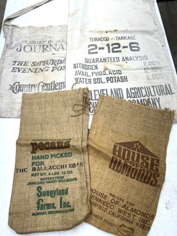 (2) CLEVELAND ADV SACKS AND (2) ALMOND SACKS: 4 SACKS FOR ALL ONE MONEY