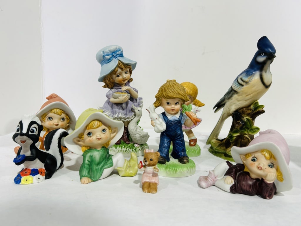 PORCELAIN GARDEN FIGURINES (1 of 5)
