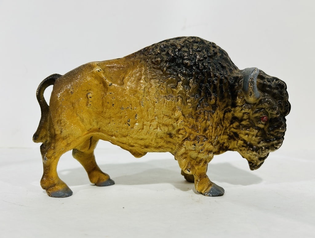 CAST IRON BISON COIN BANK: .
