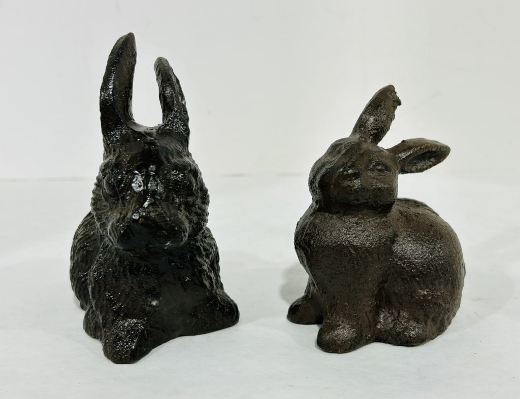 CAST IRON RABBIT FIGURINES: .
