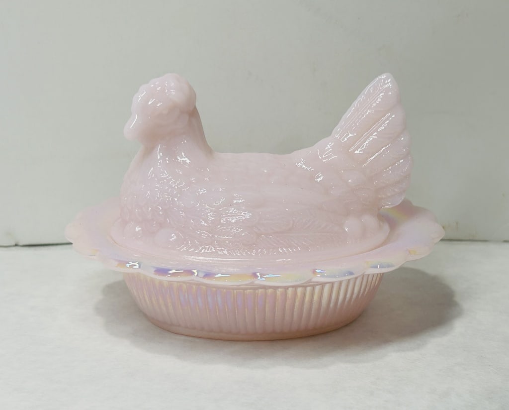 Mosser Glass Pink Iridescent Hen on Nest: This is a two-piece decorative lidded dish manufactured by the Mosser Glass Company. Married- top crown Tuscan and bottom iridescent pink basket. The dish consists of a base and a fitted lid. The base