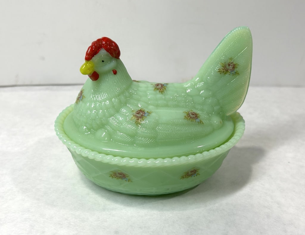 Mosser x Rosso Jadeite Glass Hen-on-Nest: The item consists of two pieces: a lid molded in the form of a nesting hen with embossed feather details and a corresponding base featuring a basketweave texture. The dish is made of Jadeite, an opaqu