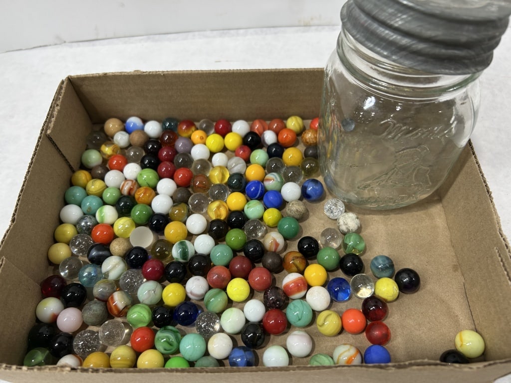 A Collection of Assorted Glass Marbles with a Mason Jar (1 of 3)