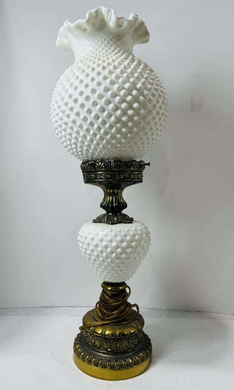 Vintage Hobnail Milk Glass Electric Table Lamp in the Style of Fenton: A vintage electric table lamp featuring a two-part milk glass body in a hobnail pattern, attributed to the Fenton Glass Company. The lamp is constructed with a large upper globe shade featuring a ruff