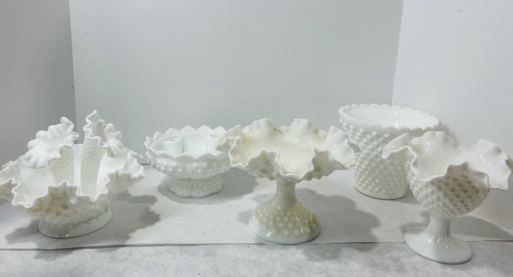 A Collection of White Milk Glass Hobnail Decorative Items: A collection of white milk glass decorative items featuring a raised hobnail pattern throughout, attributed to Fenton Art Glass. The group includes a footed epergne base with two detachable trumpet-st