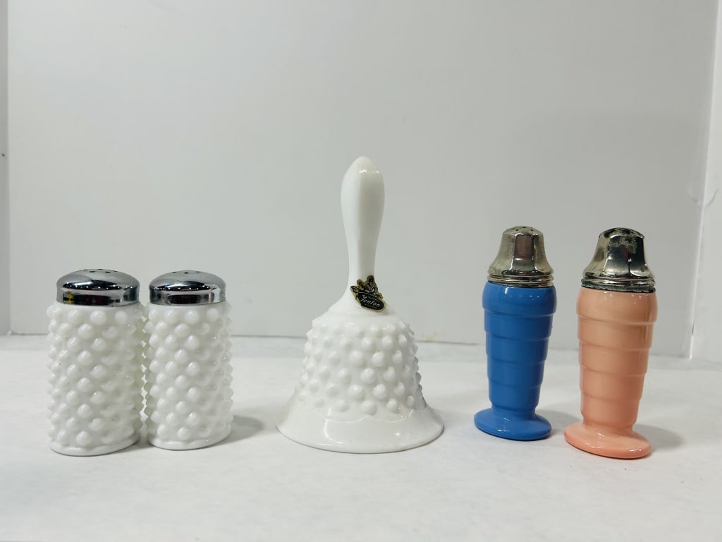 Vintage Glass Tableware Including Fenton Hobnail Milk Glass and Art Deco Style Shakers: A collection of vintage glass tableware featuring items by the Fenton Art Glass Company and Art Deco style glass. The group includes a matching pair of white milk glass salt and pepper shakers in a ho