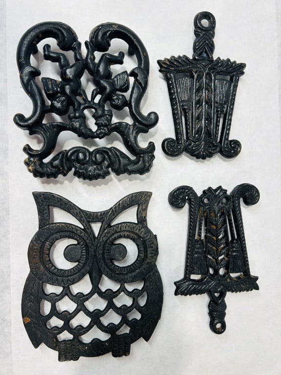 A Collection of Cast Iron Decorative Trivets (1 of 2)