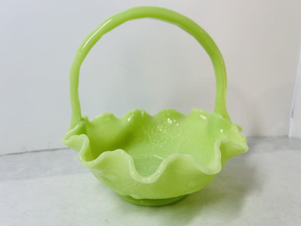 Two Pieces of Fenton Custard Glass Including a Persian Medallion Basket and a Hand-Painted Bud Vase: This lot features two pieces of Fenton Art Glass in custard glass. The first item is a decorative basket in lime green custard glass, featuring the Persian Medallion pattern with a central floral moti