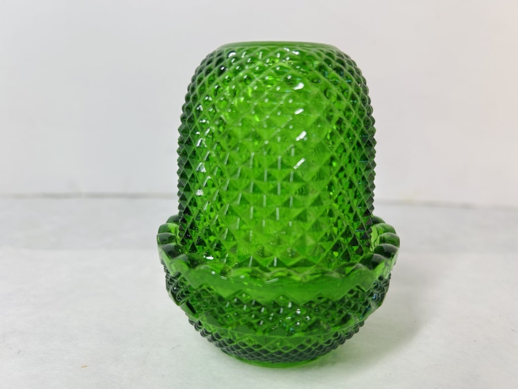 Mosser Glass Emerald Green Diamond Point Fairy Lamp: A two-piece pressed glass fairy lamp produced by the Mosser Glass Company of Cambridge, Ohio. The lamp is constructed of translucent emerald green glass and features an all-over diamond point pattern,