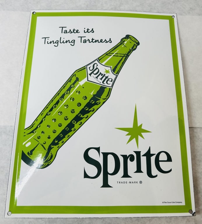 Sprite Enameled Metal Advertising Sign: A Sprite enameled metal advertising sign featuring the Tingling Tartness marketing campaign graphic. The rectangular, single-sided sign is constructed from enameled metal with a white field and a wide