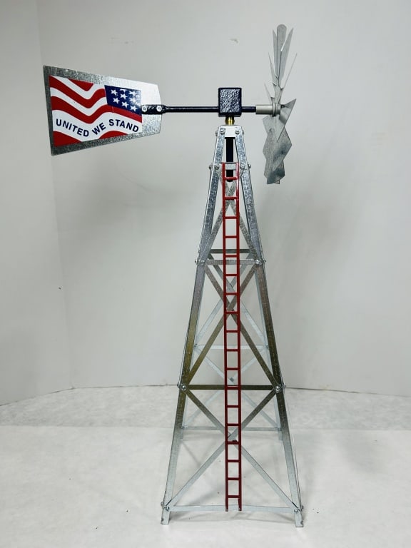 Patriotic United We Stand Decorative Galvanized Metal Model Windmill: This decorative scale model of a traditional American farm windmill is constructed of galvanized steel and features a four-legged tower with horizontal and diagonal cross-bracing. The structure is acc