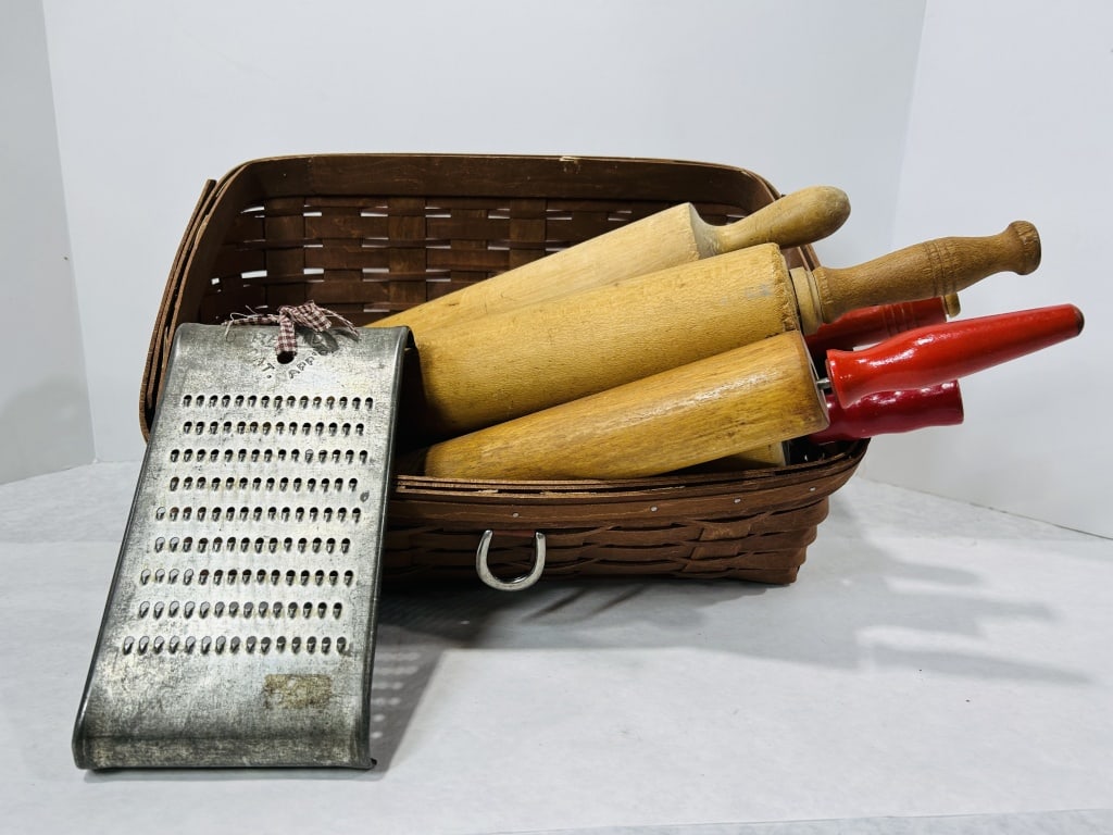 Collection of Vintage American Wooden Rolling Pins and a Rapid Brand Metal Grater in a Woven Wood: This lot consists of an assortment of vintage kitchenware and utilitarian items. Included is a galvanized metal hand grater embossed with the words RAPID and PAT. APP D. on the upper portion. A small 
