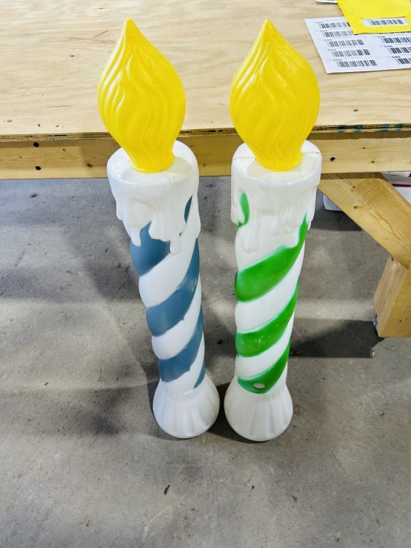 A Pair of Vintage-Style Holiday Spiral Blow-Mold Candle Decorations: A pair of vintage-style holiday blow-mold plastic candle decorations, in the style of manufacturers such as Empire or Union Products. These molded plastic forms feature a spiral-wrapped design, with o