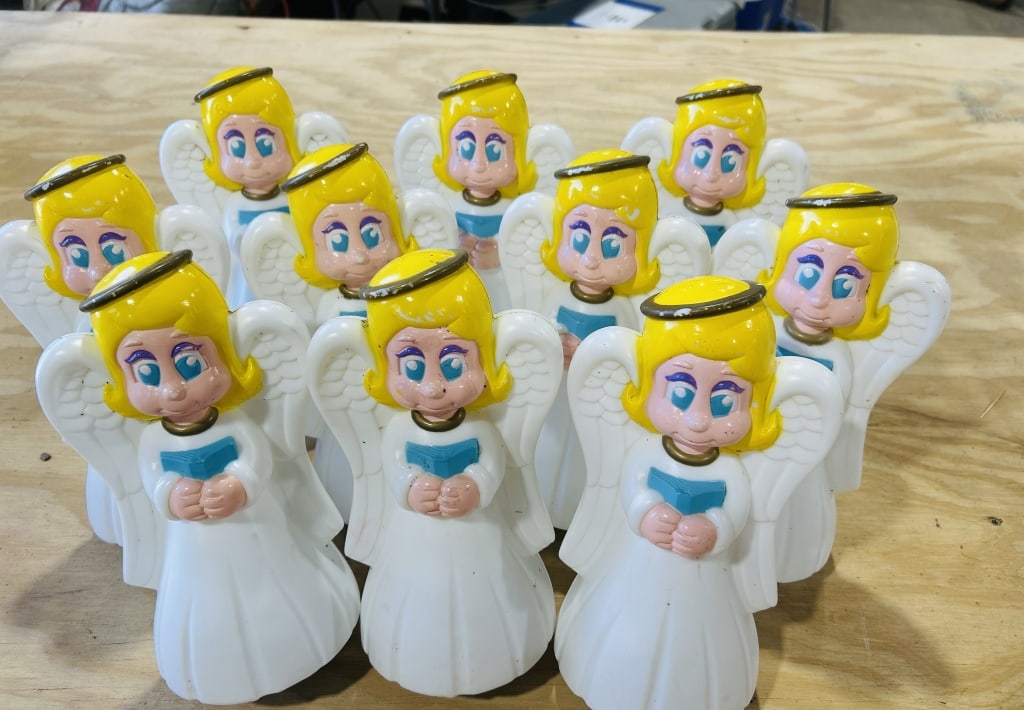Eleven Vintage Angel Pathway Light Toppers Attributed to General Foam Plastics: Eleven vintage blow-molded angel figurines, attributed to General Foam Plastics. These figures are designed as holiday pathway light toppers, depicting cherubic angels with white wings and yellow hair