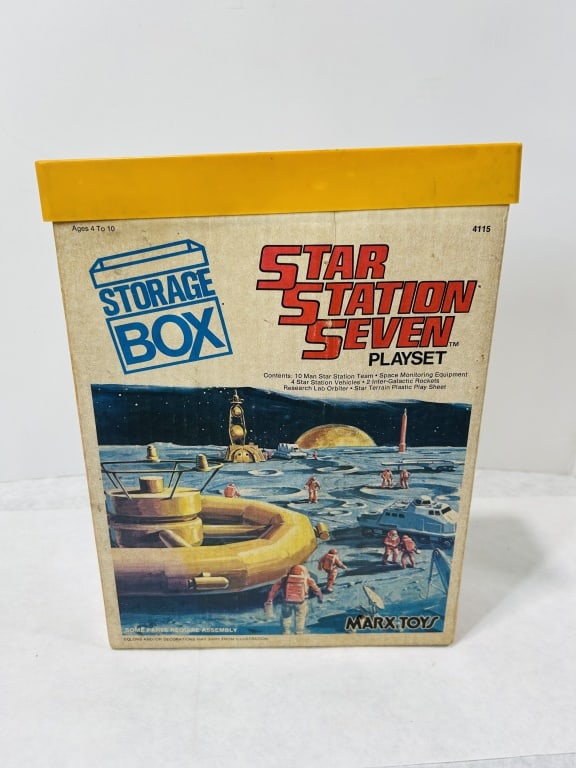 Marx Toys Star Station Seven Playset Model 4115 with Original Storage Box: This is a vintage Star Station Seven space-themed playset, model number 4115, manufactured by Marx Toys. The set is housed in its original cardboard storage box featuring an integrated yellow plastic 
