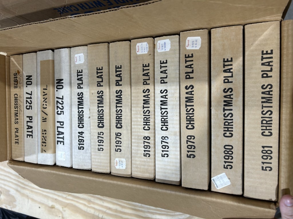 A Collection of Twenty-Four Imperial Glass Corporation Boxed Collector Plates: This lot consists of twenty-four collector plates manufactured by the Imperial Glass Corporation of Bellaire, Ohio. The items are presented in their original manufacturer retail boxes and include the 