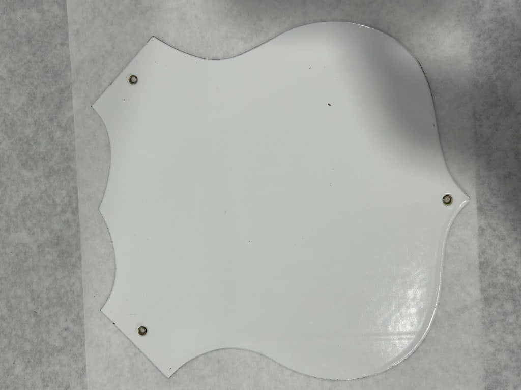 US Route 66 Missouri Highway Shield Sign: This is a die-cut highway shield sign for US Route 66 in Missouri. The piece is constructed from heavy-gauge steel finished with a white and black porcelain enamel. It features the traditional cutout 