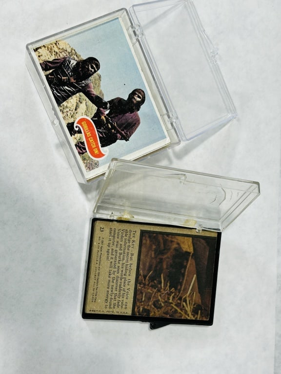 A Collection of 1974 Topps Planet of the Apes TV Series Trading Cards: A collection of vintage Topps (T.C.G.) non-sport trading cards featuring scenes and characters from the 1974 Planet of the Apes television series. The cards are constructed from standard matte cardsto