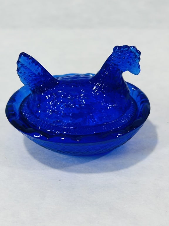 Cobalt Blue Pressed Glass Hen on Nest Covered Miniature Dish: This two-piece covered miniature dish is executed in the traditional Hen on Nest pattern, a design commonly attributed to various American pressed glass manufacturers including Indiana Glass and Boyd.