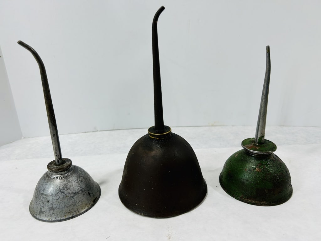 A Trio of Vintage Industrial Bell-Shaped Oil Cans (1 of 12)