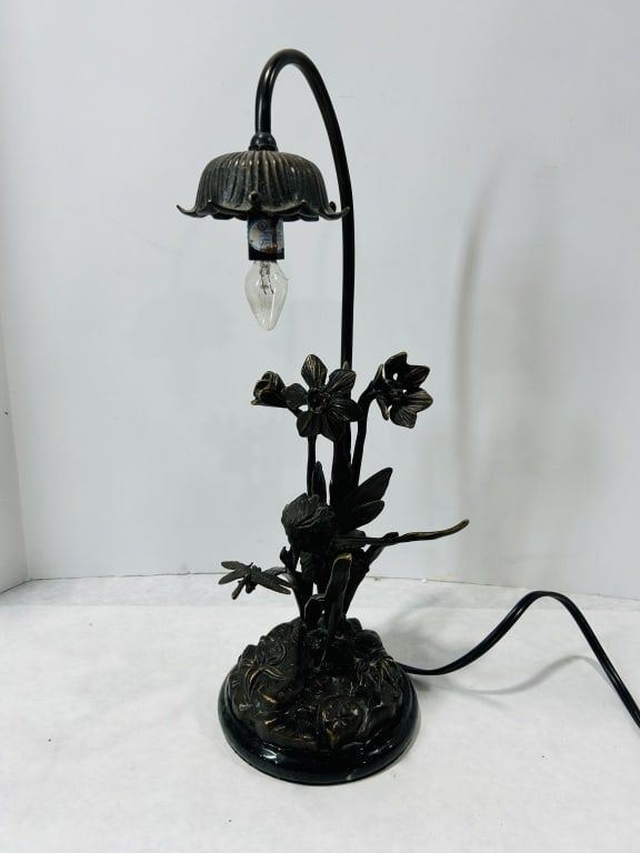 Art Nouveau Style Bronze Finished Fairy Table Lamp Attributed to Andrea by Sadek: An Art Nouveau revival figural table lamp, attributed to Andrea by Sadek. The lamp is constructed of cast metal with a dark bronze-toned patina and is mounted on a circular, stepped base of polished d