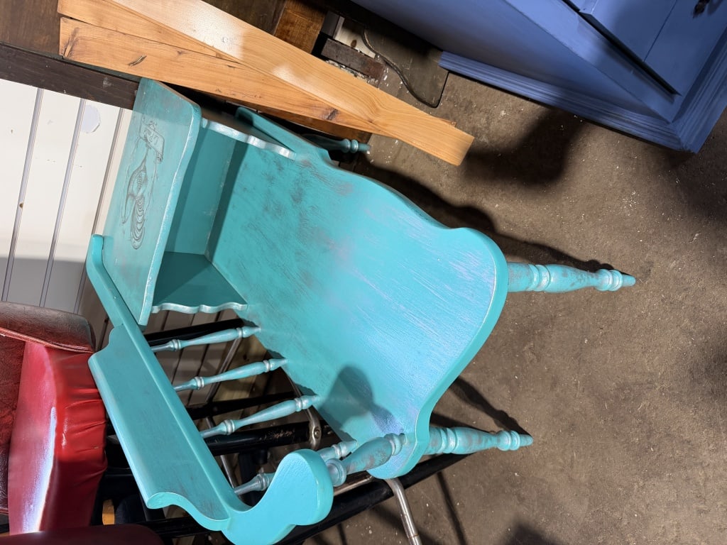 Colonial Revival Style Painted Wood Telephone Gossip Bench: This is a mid-20th century telephone bench, also known as a gossip bench, designed in the Colonial Revival style. The unit is constructed of solid wood and features a bright turquoise-teal painted fin