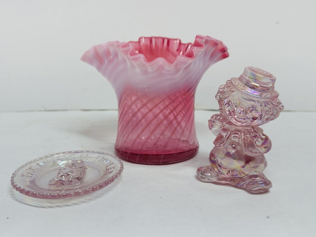 FENTON AND MOSSER PINK GLASS: Trio of pink art glass comprising a cranberry opalescent swirl ruffled vase and an iridescent Dappy clown figurine with a coordinating cup plate. The figurine and plate are embossed with the identifie