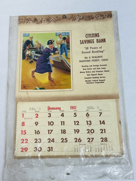 CITIZENS BANK CALENDAR AND TAXIDERMY, 1961: One promotional calendar for the Citizens Savings Bank of Martins Ferry, Ohio, featuring artwork by Hy Hintermeister, paired with a cased taxidermy specimen of a grouse. The specimen is presented in a