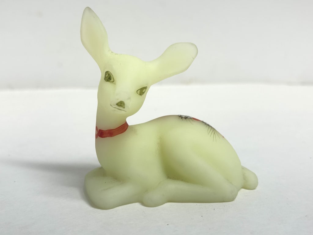 FENTON BURMESE SATIN FAWN, C. 1980: Hand-painted Burmese satin glass fawn figurine produced by Fenton Art Glass Company featuring a winter pine motif. The underside retains original paper labels and the signature of decorator C. J. Mack