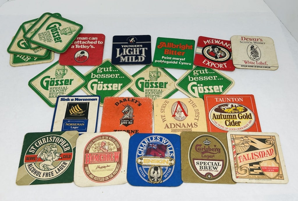 ASSORTED BREWERIES, ADVERTISING BEER COASTERS, 20TH CENTURY: A collection of vintage advertising coasters for several British and European brands including Gosser, Adnams, and McEwan's. The group features printed graphics for various lagers, bitters, ciders, an